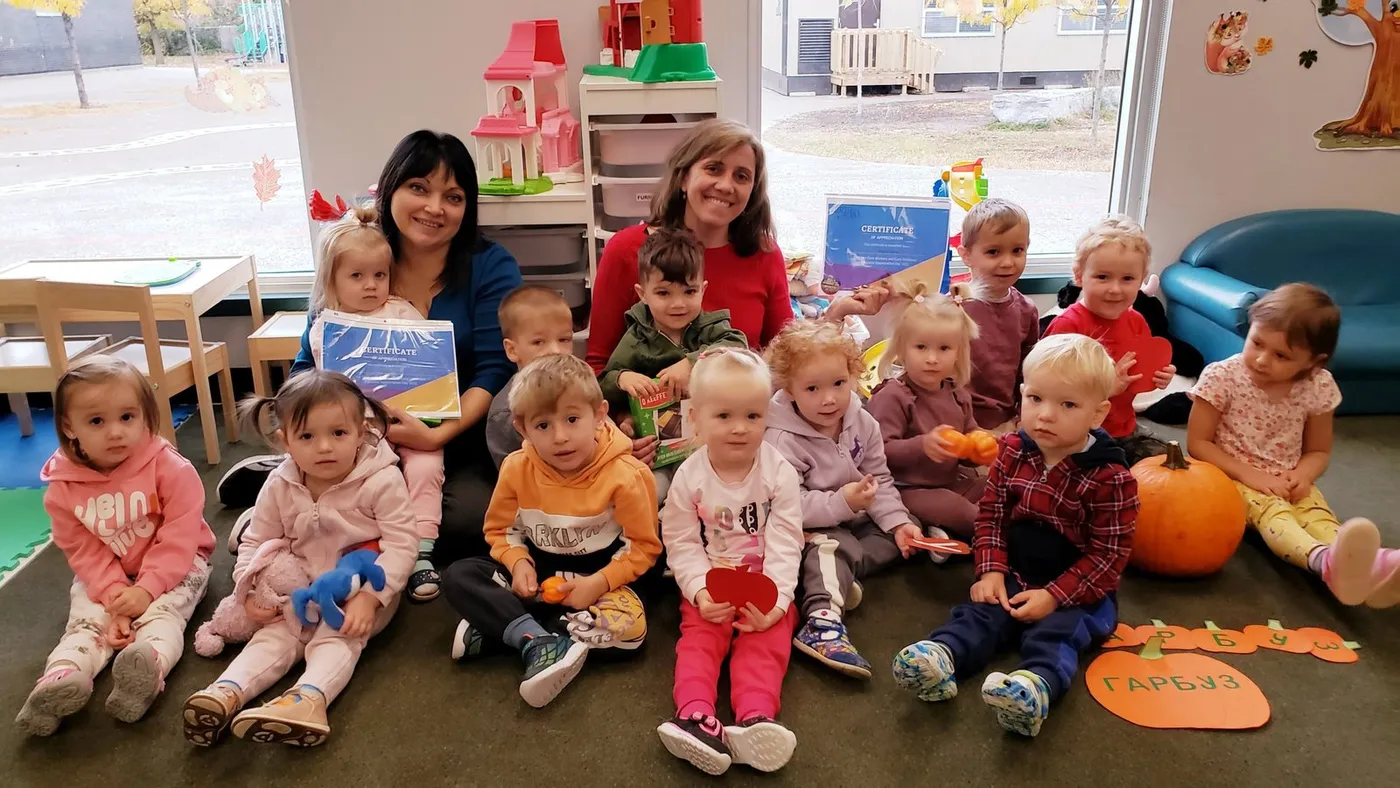 Children and teachers at Sadochok Preschool Centre
